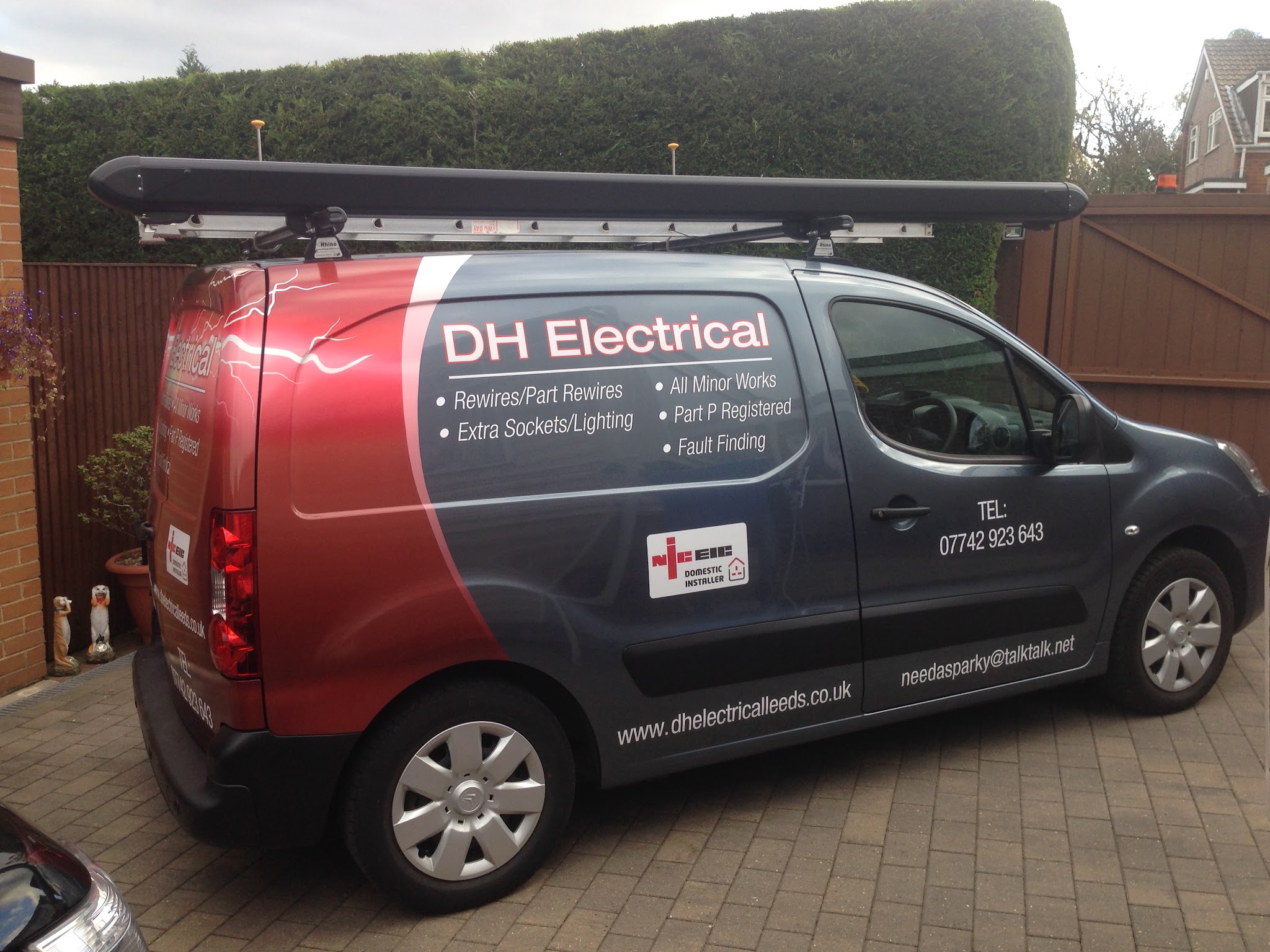 D H Electrical's red and graphite van with its service lettering